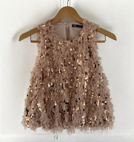 Top plumas